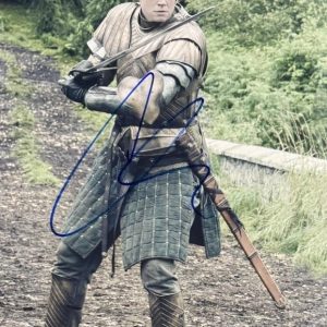Gwendoline Christie in full armor as Brienne of Tarth with sword raised, signed in blue marker